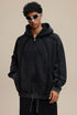Front close view of black zip hoodie showing sculpted panel seams