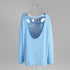 Back view of light blue backless knit sweater with open scoop back