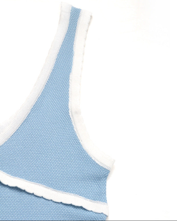 Side view of lace-trimmed cami tank showcasing the angled hem and strap design.