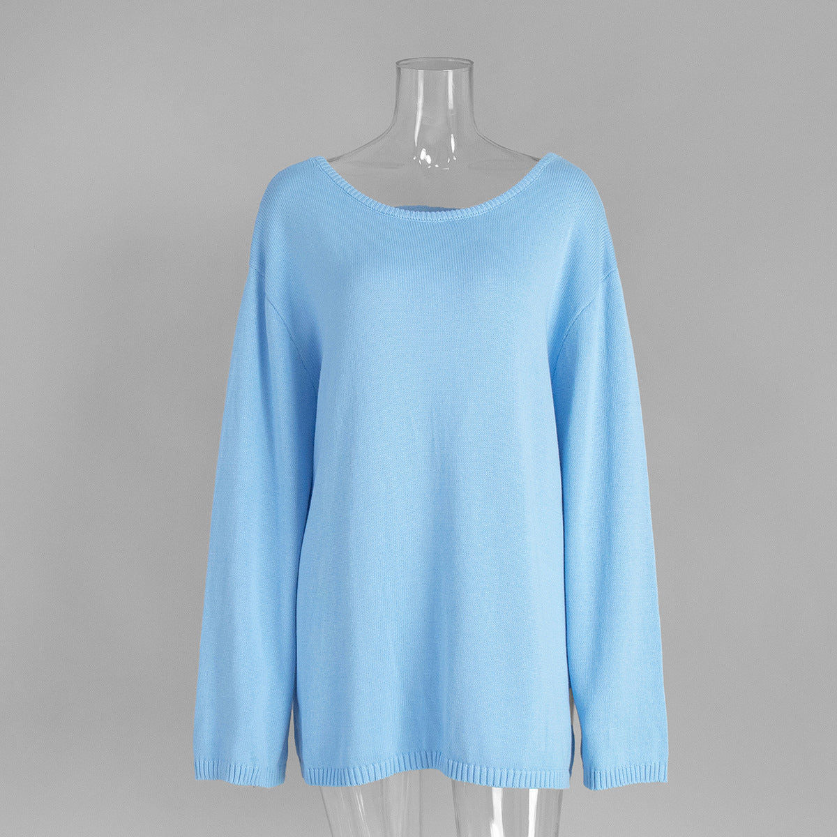 Front view of light blue knit sweater with long sleeves