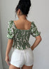 Back view of boho leaf print off shoulder crop blouse