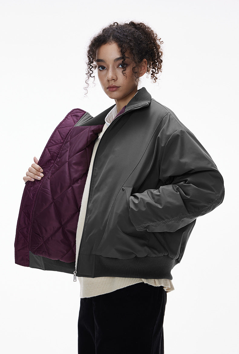 Gray bomber jacket, hands in pockets, clean street fit
