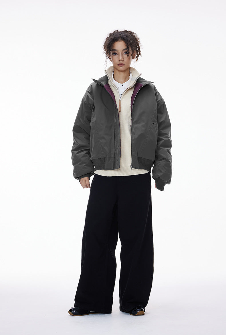 Gray stand-collar bomber, zip closed, relaxed wide-leg pants