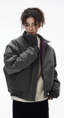 Close view—gray bomber stand collar and zipper, minimal top block