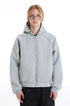 Front view of the light gray zip-up hoodie showing the structured hood and welt pockets