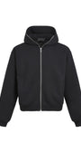 Studio flat-lay product image of the solid black boxy zip up hoodie jacket.