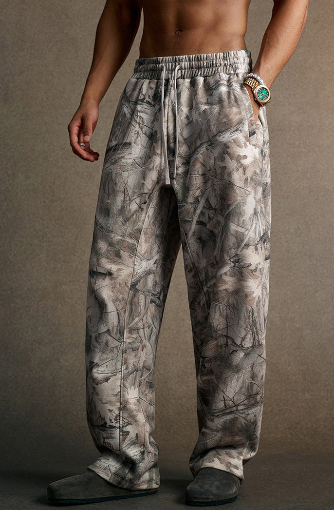 men branch camo polyester fleece sweatpants three-quarter side view with pocket detail