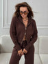 Brown knit 2 piece outfit featuring wide leg pants and zip jacket