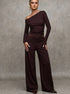 brown knit co ord set with asymmetric off shoulder top and wide leg trousers