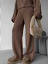 Close up of relaxed brown knit lounge set with oversized sleeves