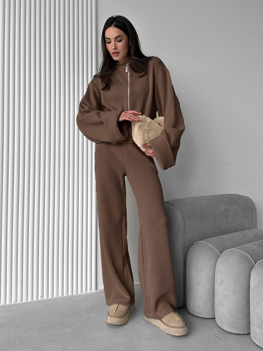 Woman wearing brown knit lounge set with zip jacket and pants