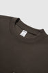 Dark brown oversized long sleeve pocket t-shirt close-up