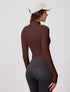 Back view of brown long sleeve workout jacket with zipper