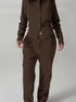 brown ribbed co ord set worn by model full body front view