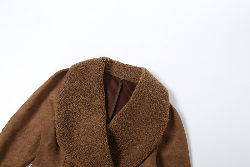 close-up of brown suede jacket fur collar on white background