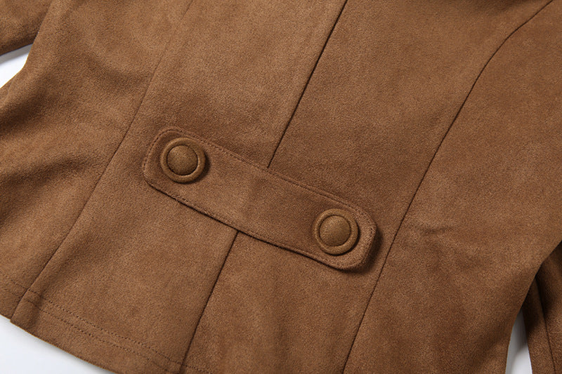 close-up of brown suede jacket waist seam and fabric texture