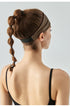 Back view of woman wearing brown workout headband with elastic strap.