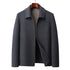 Charcoal gray wool jacket with zippered front and stand collar displayed on wooden hanger