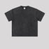 Plain black washed oversized t-shirt with crew neckline shown flat against light gray background, back view