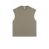 Light sage green oversized sleeveless muscle tee with crew neckline and manufacturer's tag visible, displayed flat against white background
