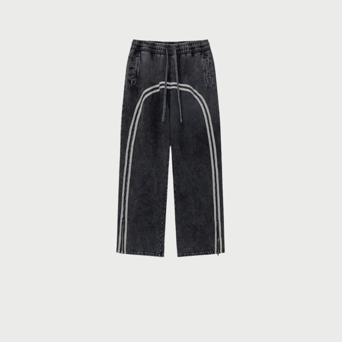 Full product shot of black washed denim track pants with twin gray side stripes and relaxed wide-leg fit