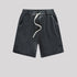 A pair of black washed drawstring shorts with a soft, vintage-inspired fabric, elastic waistband, and white drawstrings