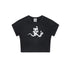 Flat lay of a black cropped t-shirt with a white devil girl and snake graphic
