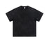 Product shot of plain black oversized t-shirt with crew neck and short sleeves on plain background
