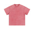 Product shot of lavender acid-washed oversized t-shirt with crew neck and short sleeves on plain background