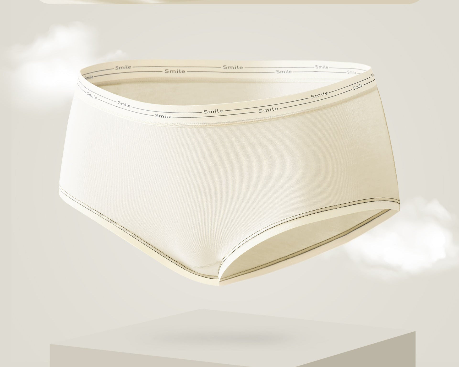 Antibacterial brief in light nude with 'Smile' printed elastic waistband trim.