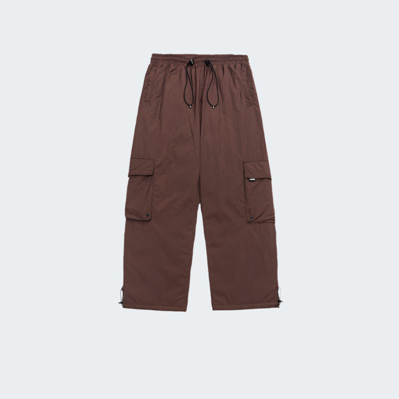 Brown cargo pants product shot displaying pocket placement and relaxed silhouette against white background