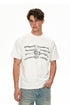 Close-up of white chain graphic T-shirt featuring monochrome chain-and-tag artwork