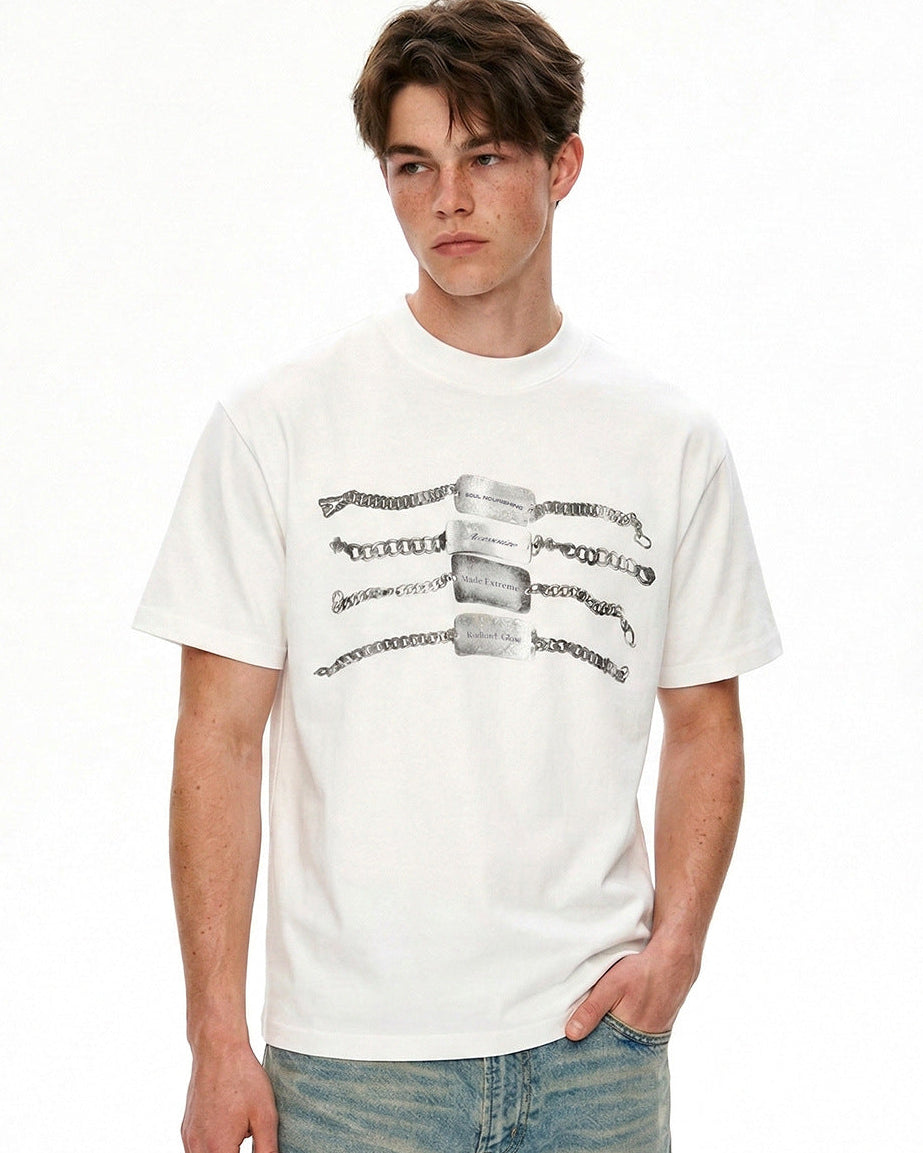 Close-up of white chain graphic T-shirt featuring monochrome chain-and-tag artwork