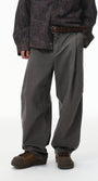 Charcoal corduroy pants front view on model, wide leg with straight cuff