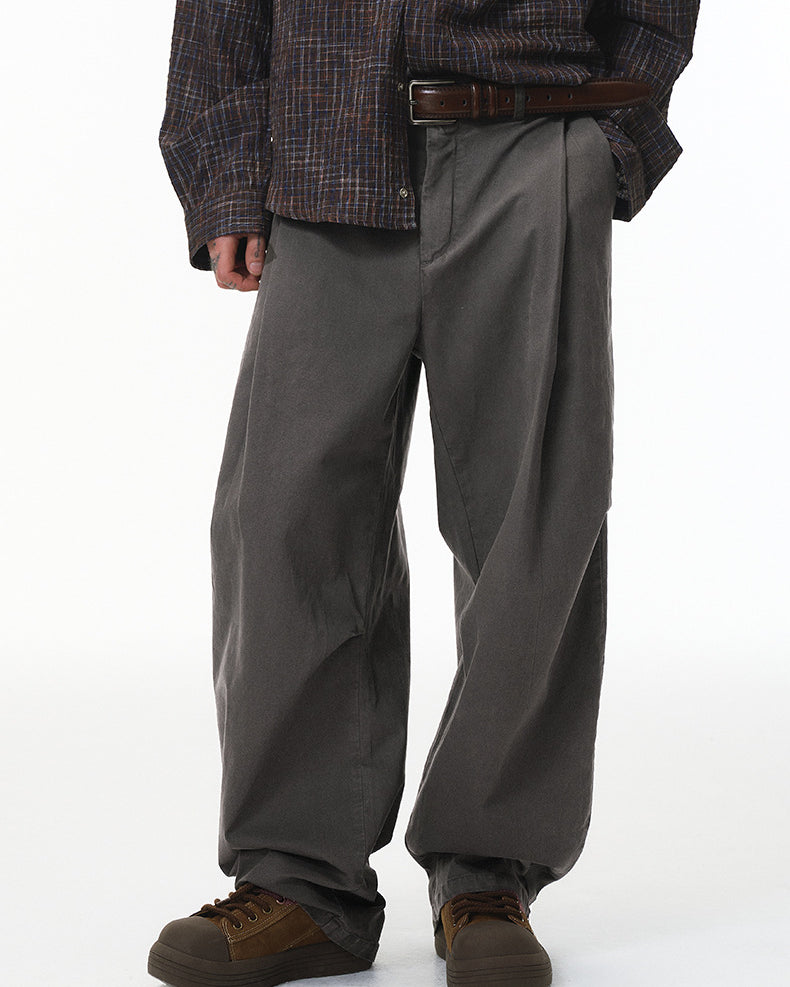 Charcoal corduroy pants front view on model, wide leg with straight cuff