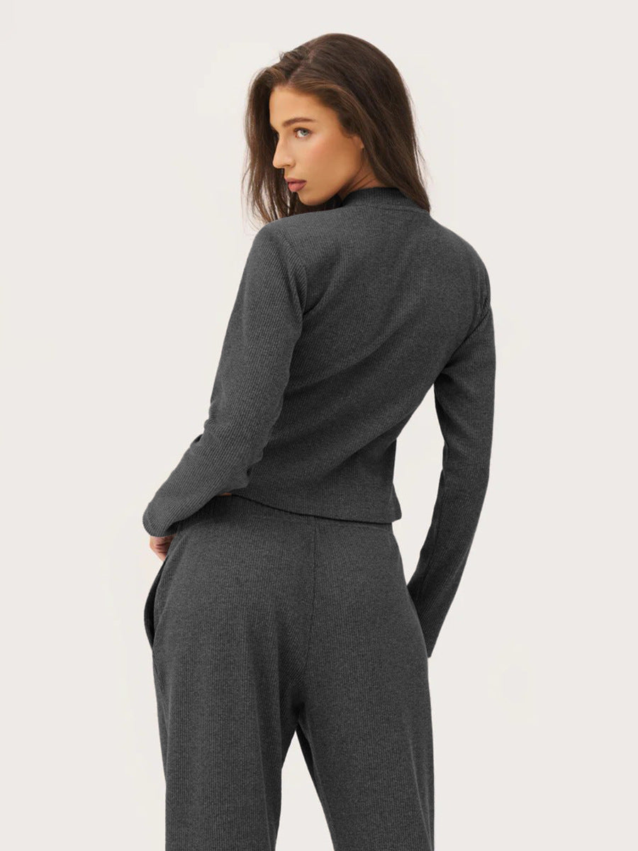 back view of charcoal ribbed co ord set worn by model