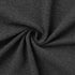 charcoal ribbed knit fabric texture shown in twisted close-up