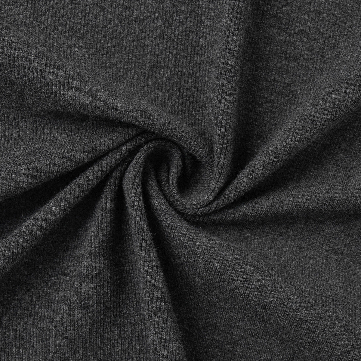 charcoal ribbed knit fabric texture shown in twisted close-up