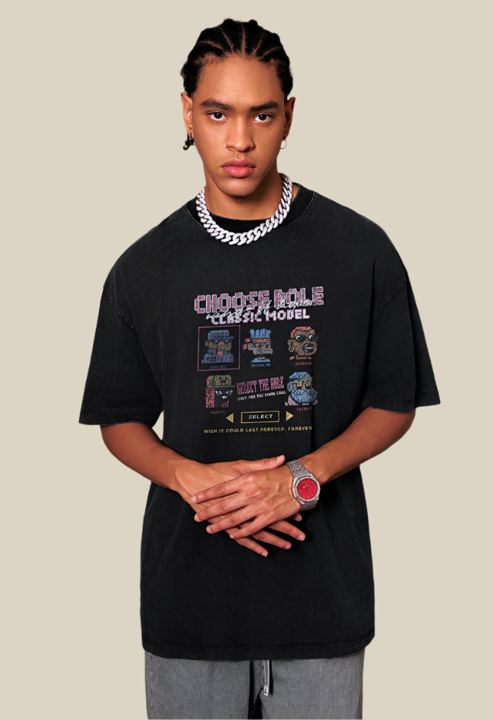 Man in streetwear look posing with folded arms wearing pixel game tee