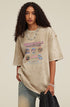 Khaki pixel tee with Choose Role graphic worn by woman, upper view
