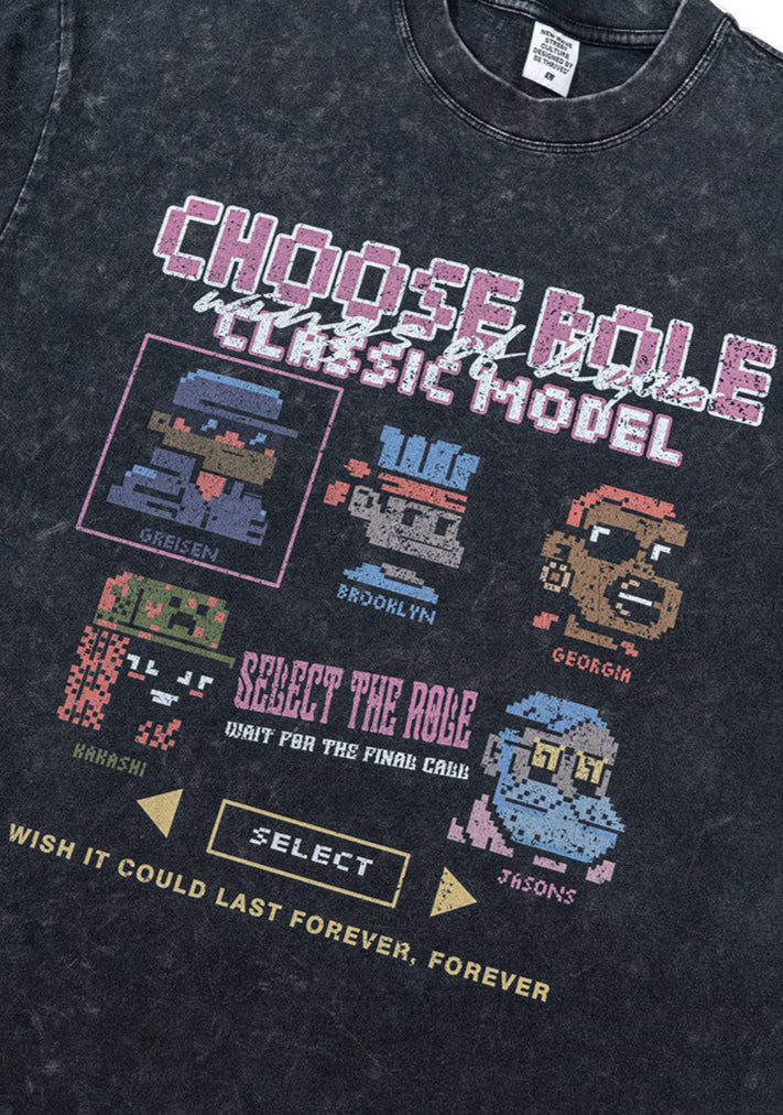 Angled close-up of Choose Role retro pixel print on black tee