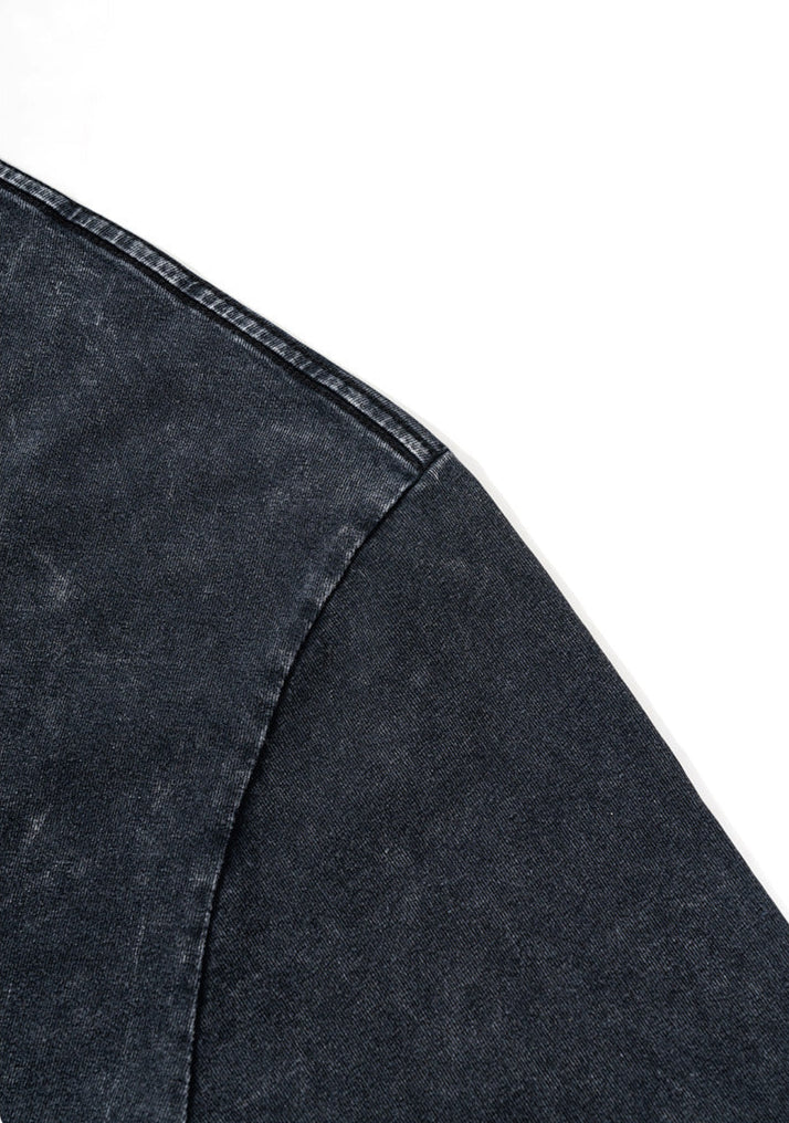 Shoulder seam close-up of washed black Choose Role tee