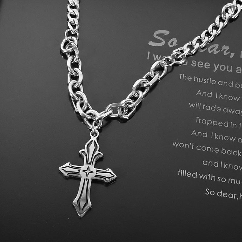 Silver chunky cross necklace close-up.