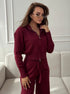 Claret knit 2 piece outfit styled with zip jacket and long pants