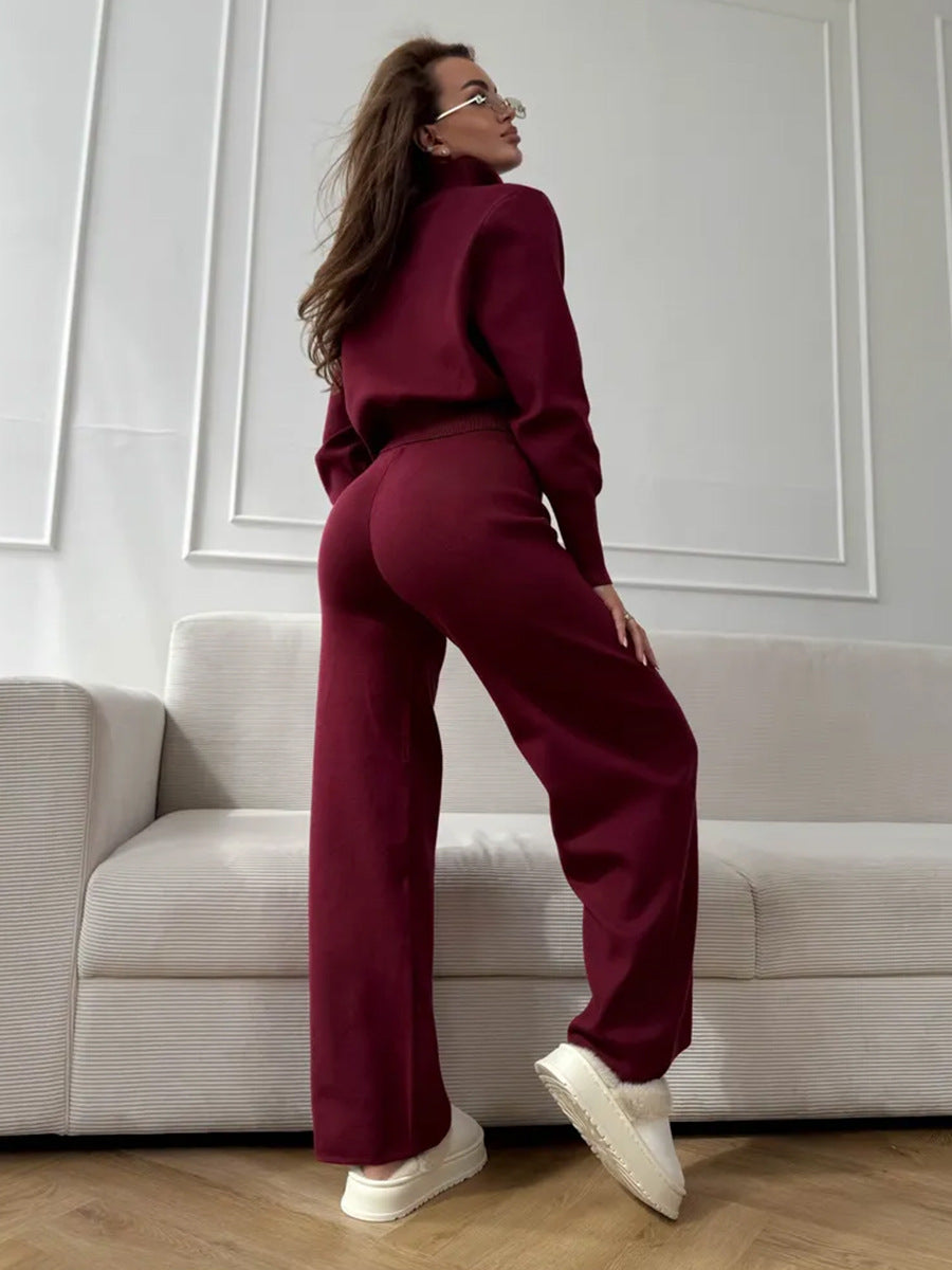 Back view of claret 2 piece knit set with casual zip jacket and wide leg pants