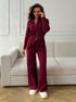 Woman wearing claret knit 2 piece set with zip jacket and pants