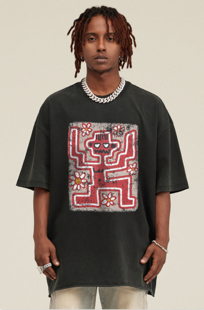 Frontal close-up of black graphic tee with red skeleton and flower artwork.