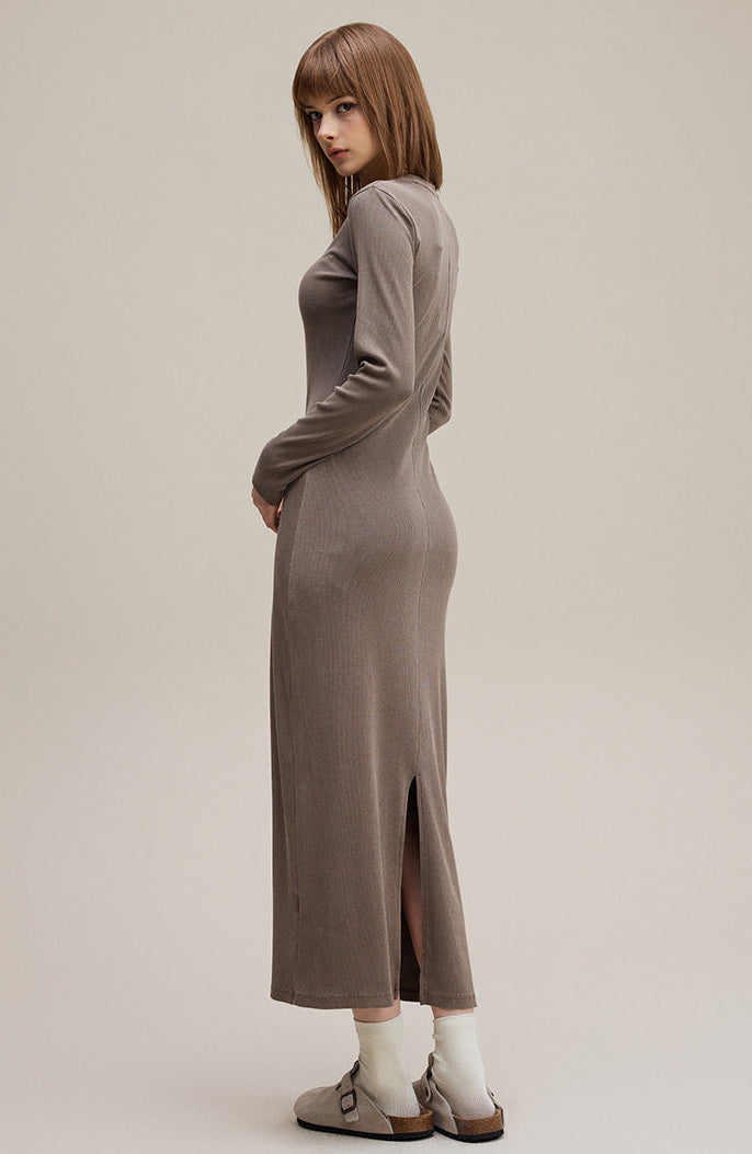 Coffee brown long sleeve bodycon dress, side view showing slit and pockets