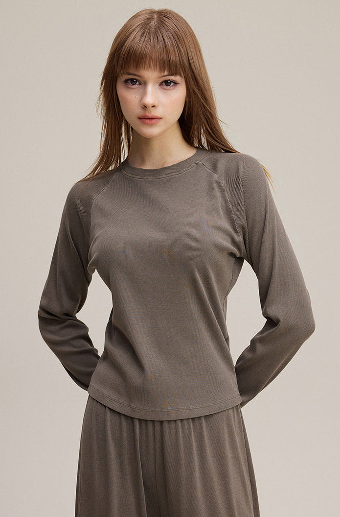 Model wearing coffee brown women’s long sleeve tee front view