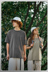 Couple wearing unisex oversized cotton tees outdoors